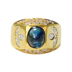 Bague en or jaune 18 carats, diamant et saphir bleu