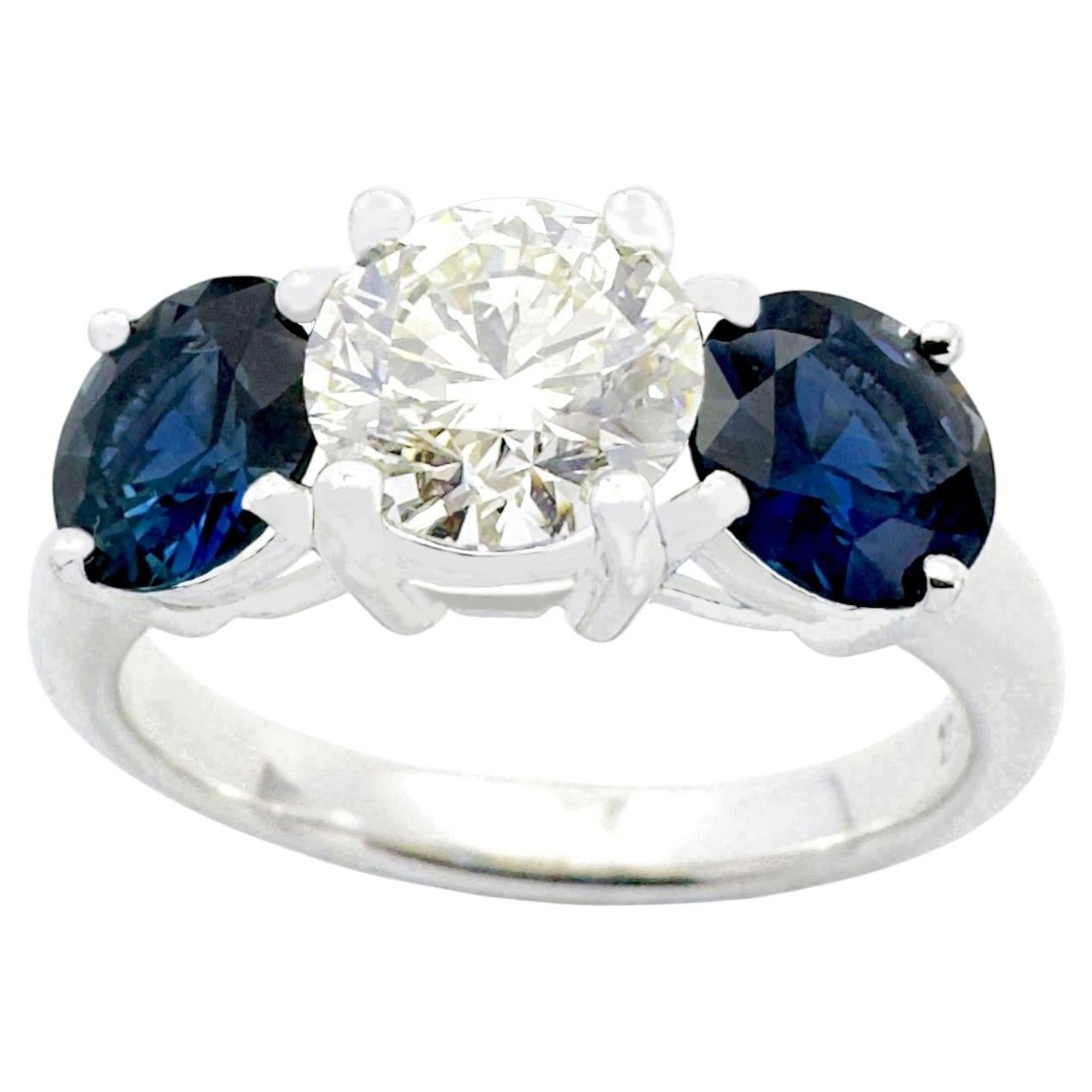 Diamond and Blue Sapphire Ring set in 18K White Gold Settings