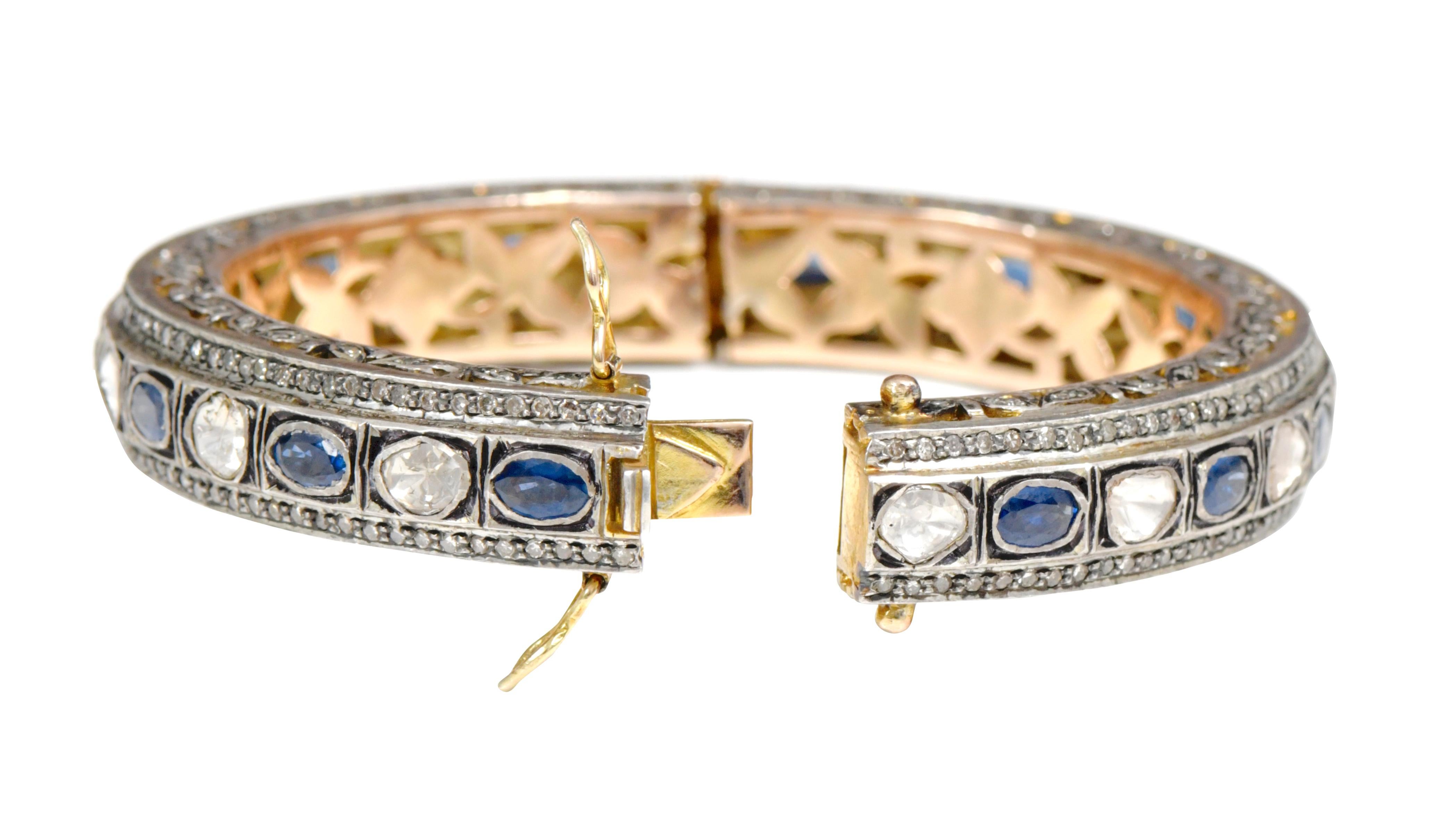 Oval Cut Diamond and Blue Sapphire Tennis Bangle in Art Deco Style For Sale