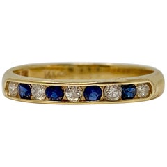 Diamond and Blue Sapphire Wedding Band in Yellow Gold