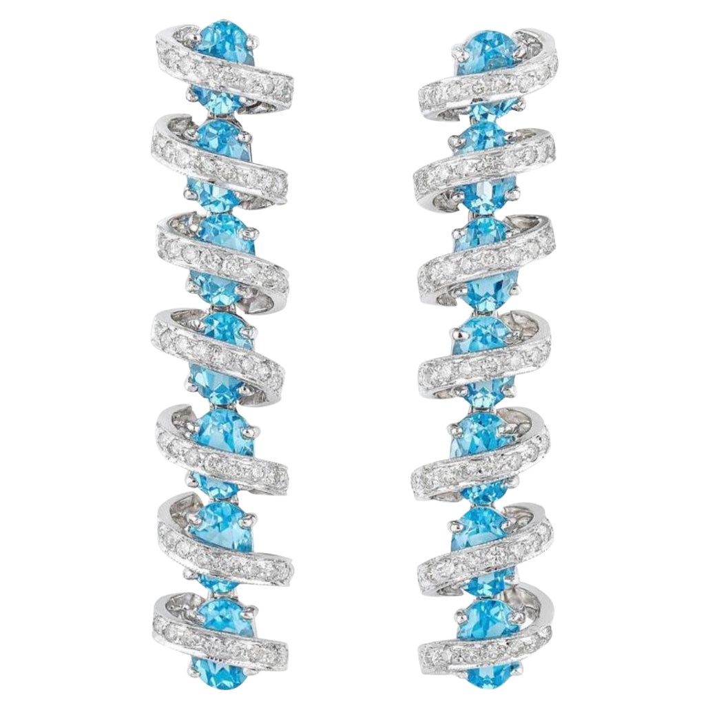 Pendientes de Diamantes y Topacio Azul en Oro Blanco de 18 Kilates en venta