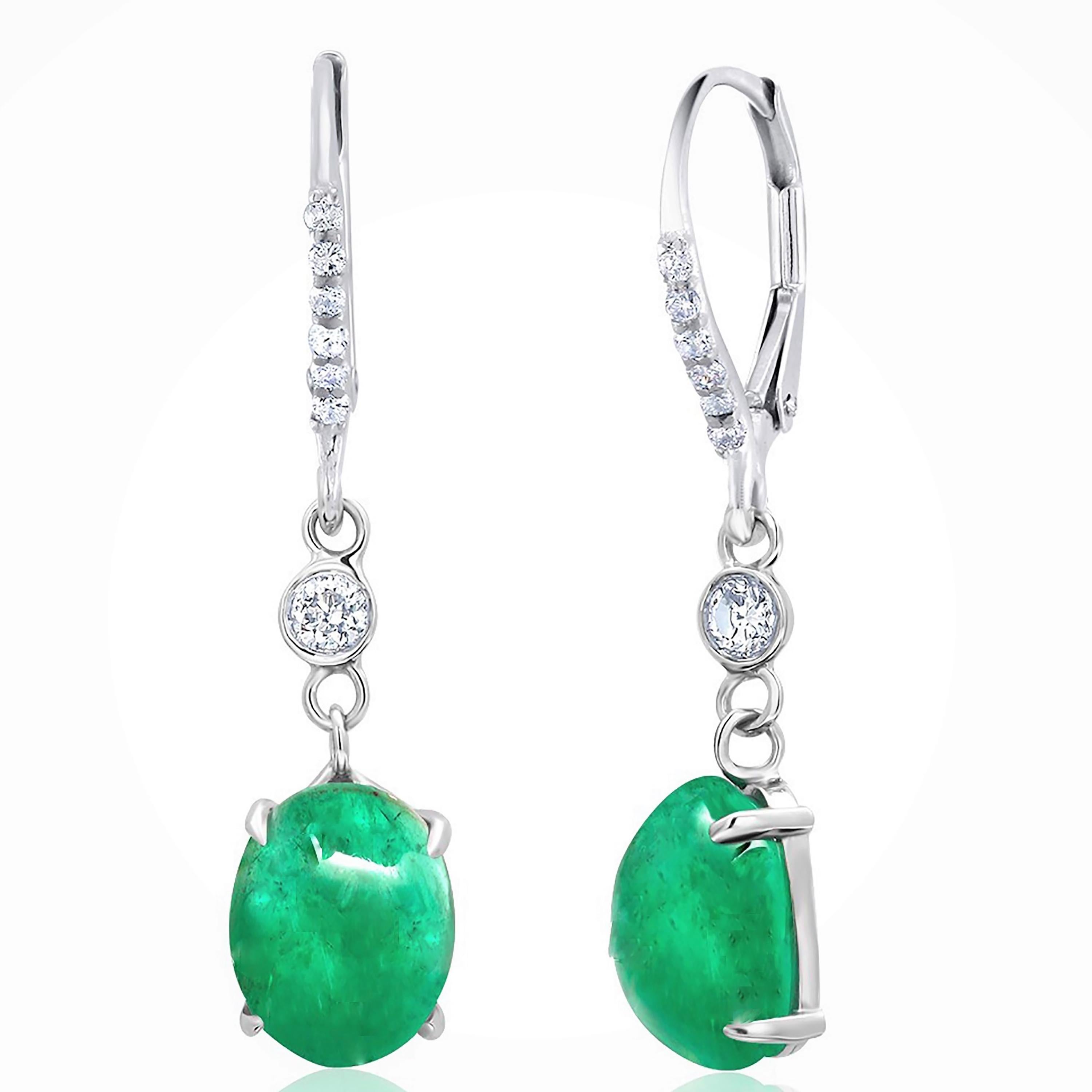Fourteen karats white gold cabochon emerald and diamond hoop drop earrings 
Diamond weighing 0.45 carat
Cabochon emeralds weighing 4.68 carat 
New Earrings
One of a kind earrings 
Handmade in the USA
Fourteen karat gold earrings are hanging off a