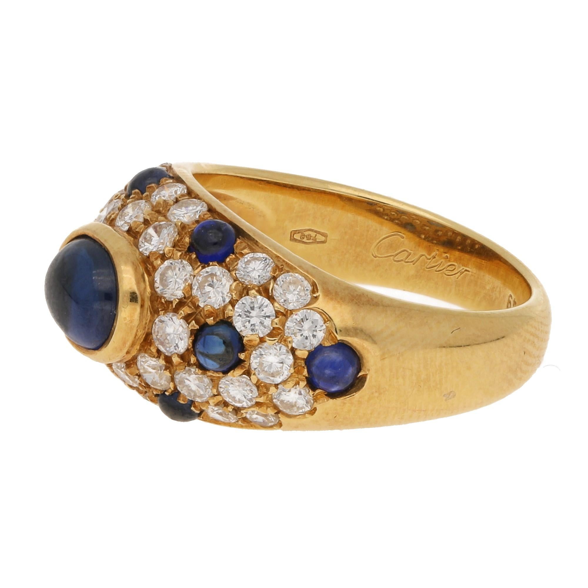 This wonderful Cartier ring is a true testament to classic Cartier design from the 1990's with the panthere design including diamonds and sapphires.The ring features round brilliant cut diamonds totalling 1.08ct and cabochon sapphires scattered