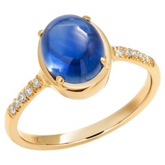 Diamond and Ceylon Cabochon Sapphire Eighteen Karat Yellow Gold Cocktail Ring