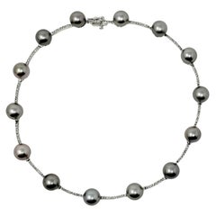 Vintage Diamond and Cultured Tahitian Silver Pearl 14 Karat White Gold Station Necklace