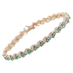 Diamond and Emerald 10 Karat Yellow Gold Link Bracelet