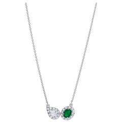 Diamond and Emerald A-Symmetrical Pendant Necklace Set in 18 Karat White Gold 