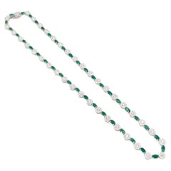 Diamond and Emerald Alternating Tennis Necklace. Natural Stones. 18K White Gold