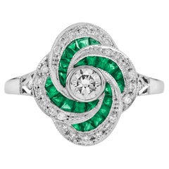 Diamond and Emerald Art Deco Style Swirling Engagement Ring in 18K White Gold