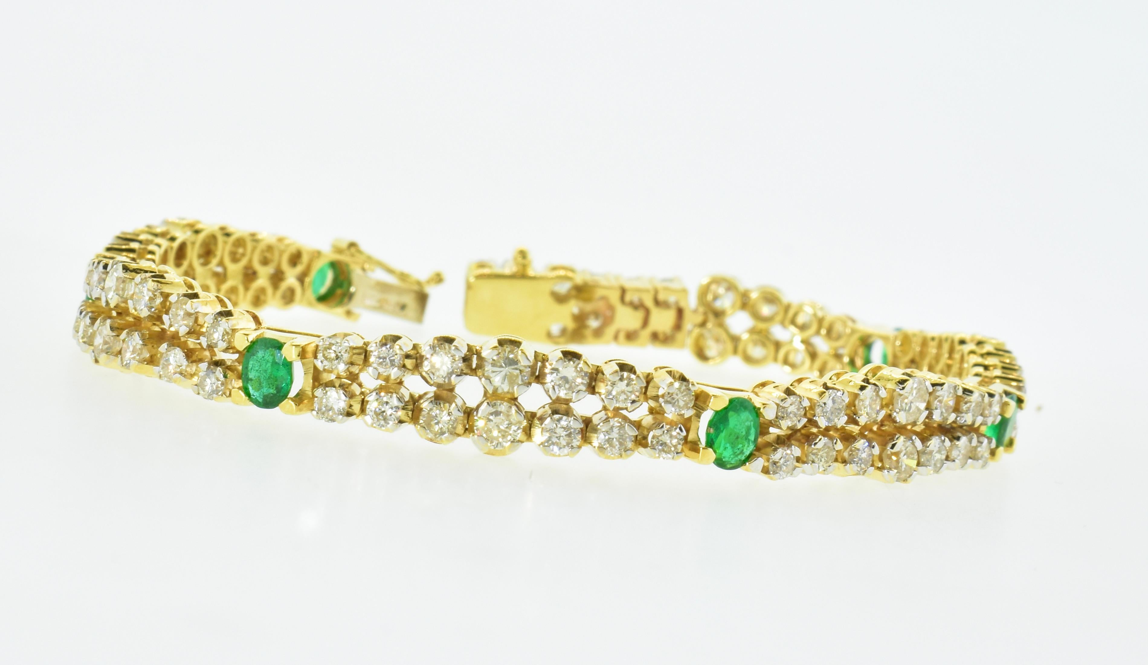Emerald and diamond bracelet in yellow gold, this flexible bracelet holds 6 oval natural green emeralds weighing approximately 1.25 cts. totally.  There are a total of 90 white diamonds all near colorless (I), and very slightly included to slightly
