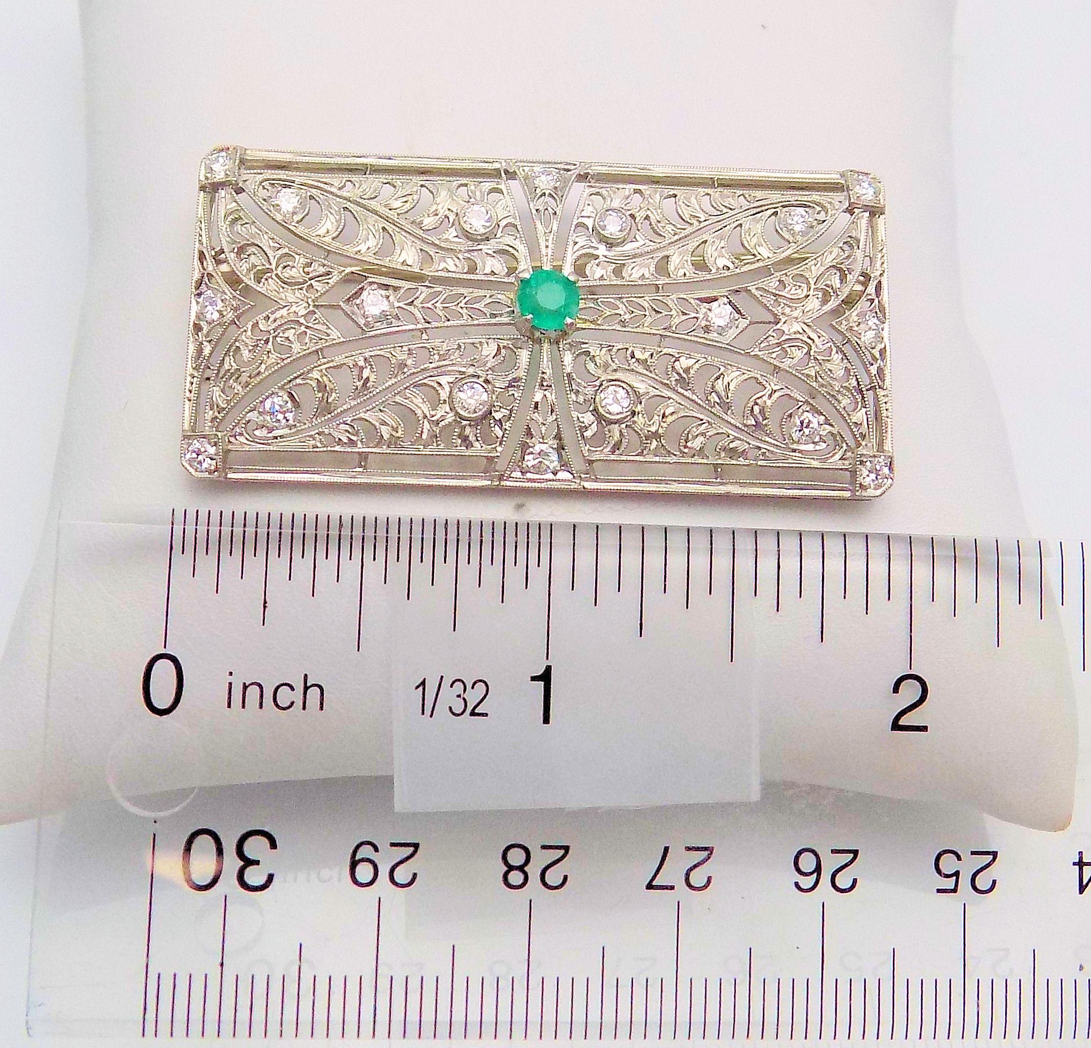Round Cut Diamond and Emerald Brooch For Sale