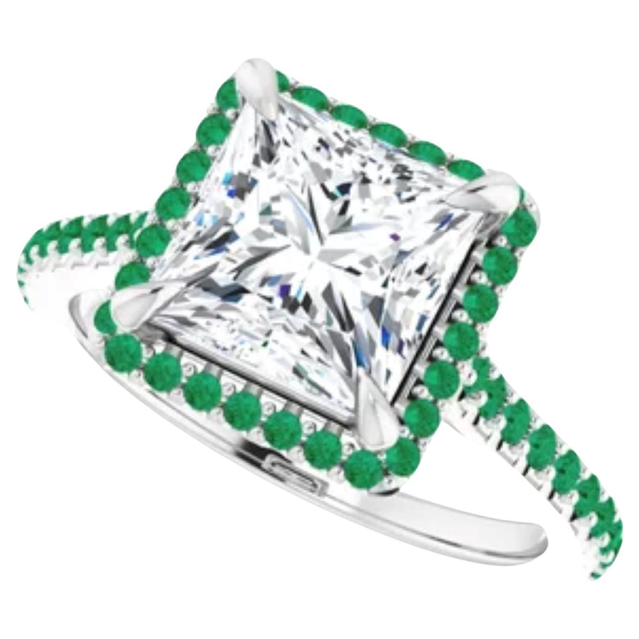 Diamond and emerald cut engagement ring For Sale