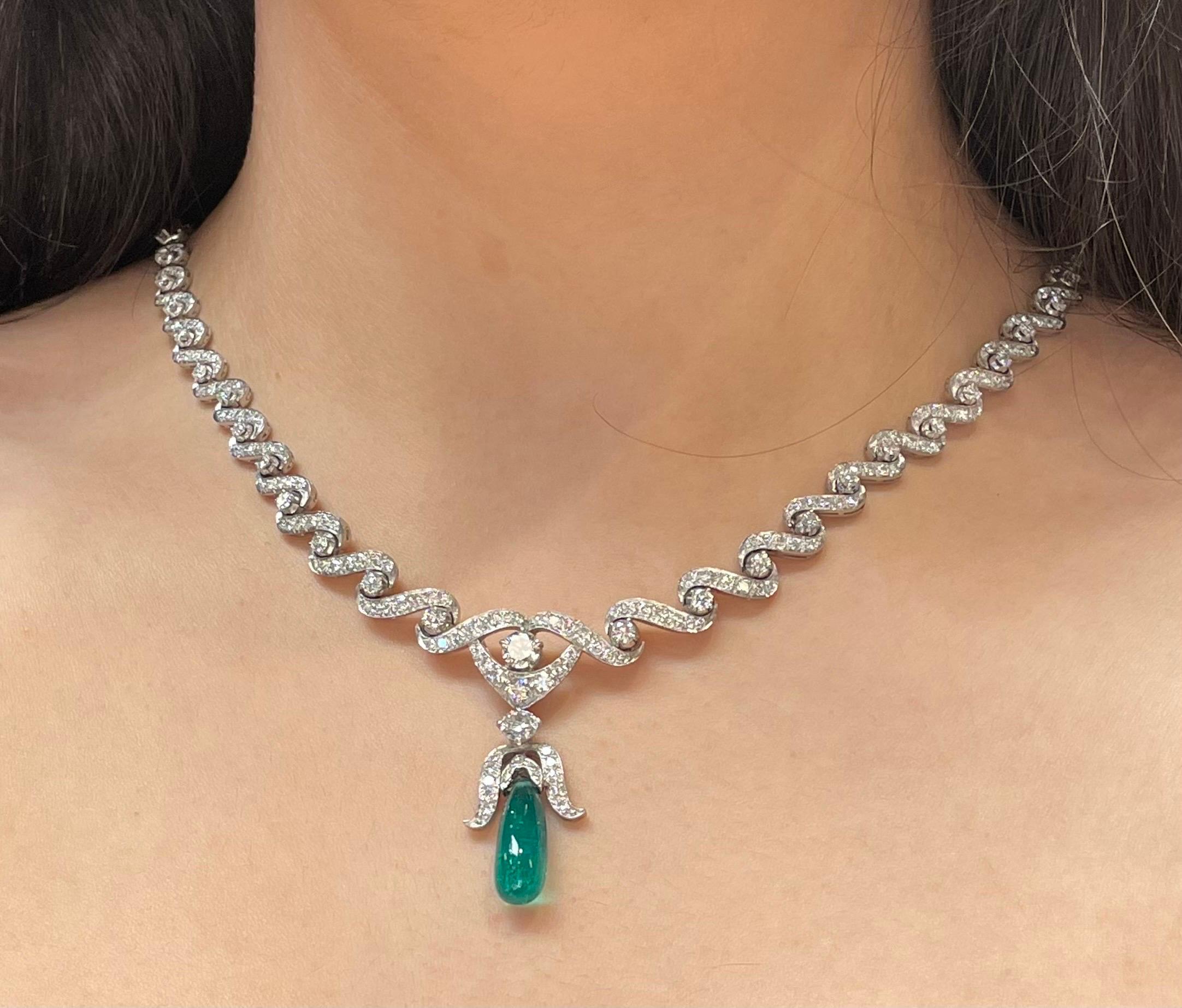 Diamond and Emerald Drop Necklace

A platinum necklace set with round-cut diamonds a pendant with an emerald drop.

Approximate Diamond Weight: 8.5 carats
Approximate Emerald Weight: 7.45 carats
Approximate Chain Length: 15