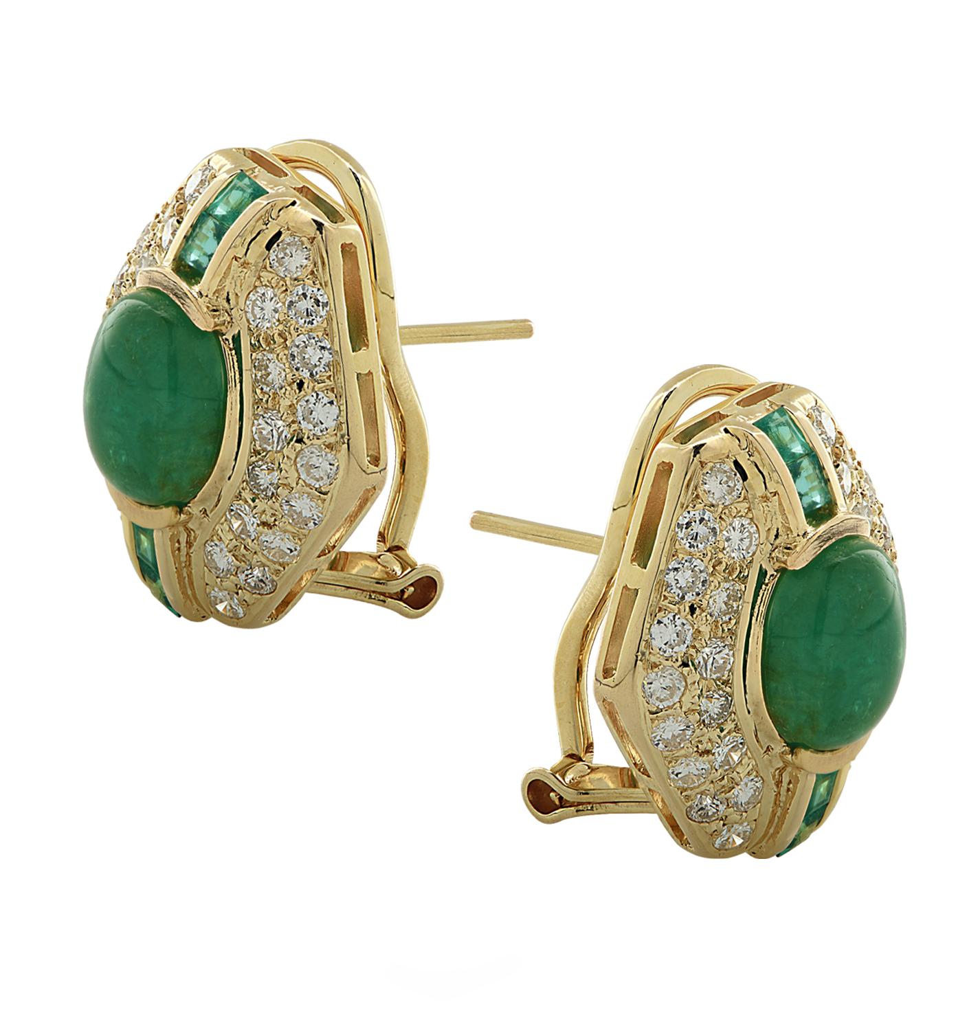 Attractive earrings crafted in 14 karat yellow gold, featuring 60 round brilliant cut diamonds weighing approximately 1.5 carats total, G color, VS-SI clarity and 2 oval emerald cabochons weighing approximately 3..5 carat total and 8 carre cut