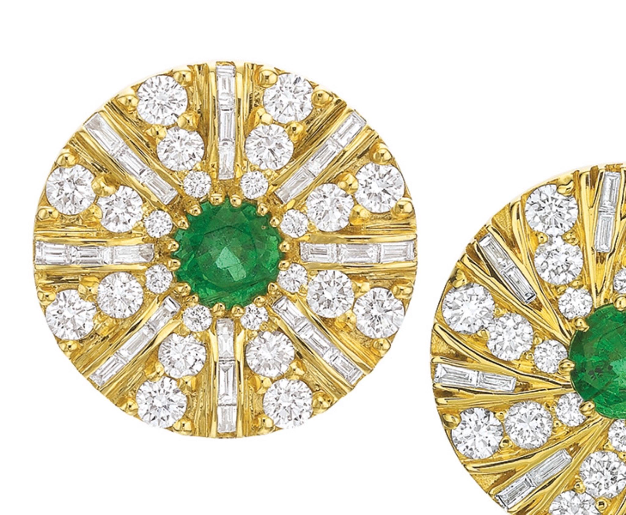 From Andrew Glassford's evolving Shazam Series are a great looking pair of 1.24 ctw Columbian Emeralds surrounds by Diamonds. The Diamonds consists of .48 ctw of GH VS Baguette Diamonds and 1.94 ctw of GH VSI round diamonds. The earrings are