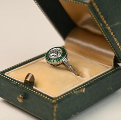 Diamond and Emerald Halo Engagement Ring. 0.60ct Old Euro Cut Platinum I VS2