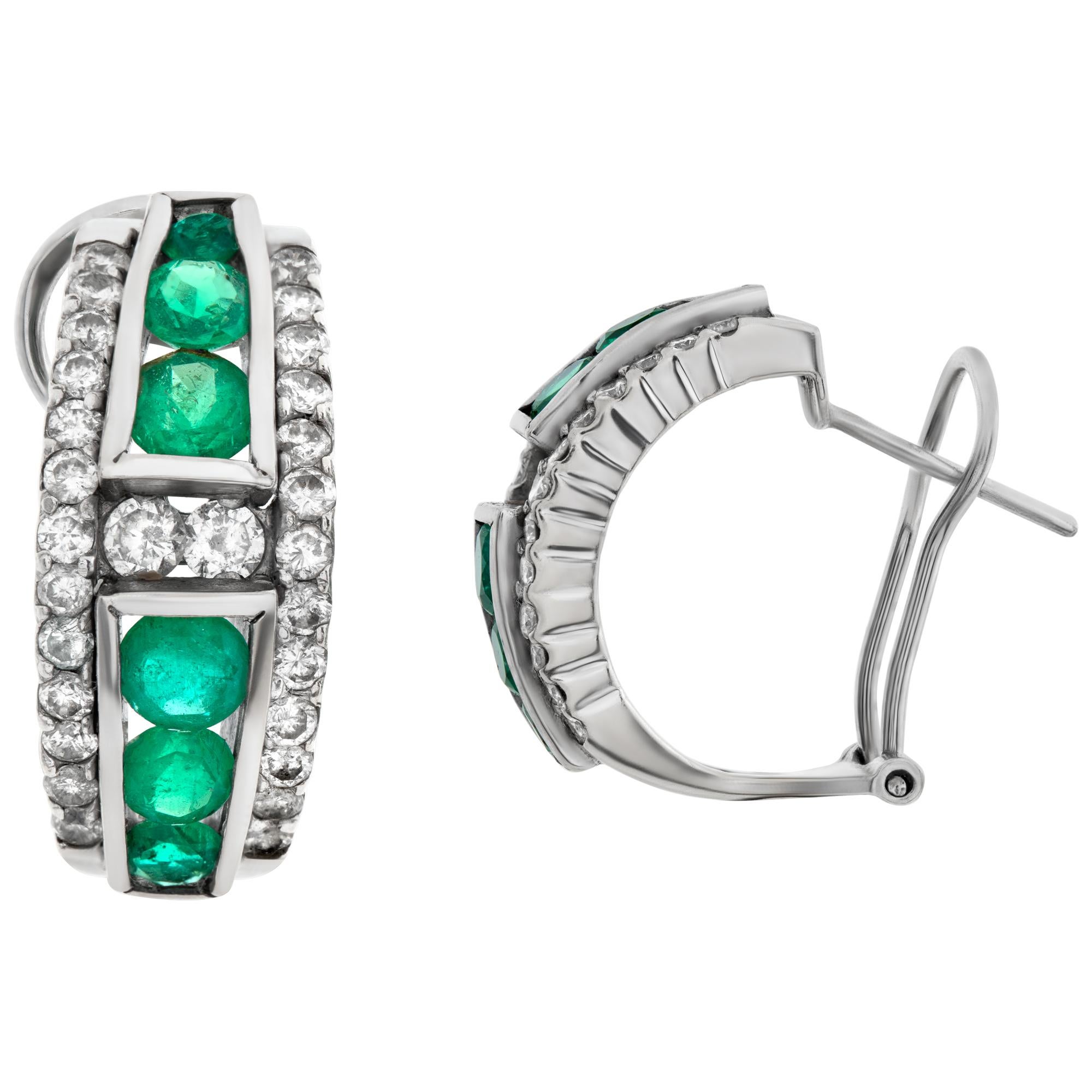 Diamond and Emerald Huggie Earrings in 18k White Gold with Omega Clip Backs In Excellent Condition In Surfside, FL