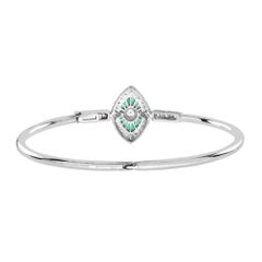 Pulsera brazalete estilo Art Déco con diamantes y esmeraldas de forma marquesa en oro de 14 quilates