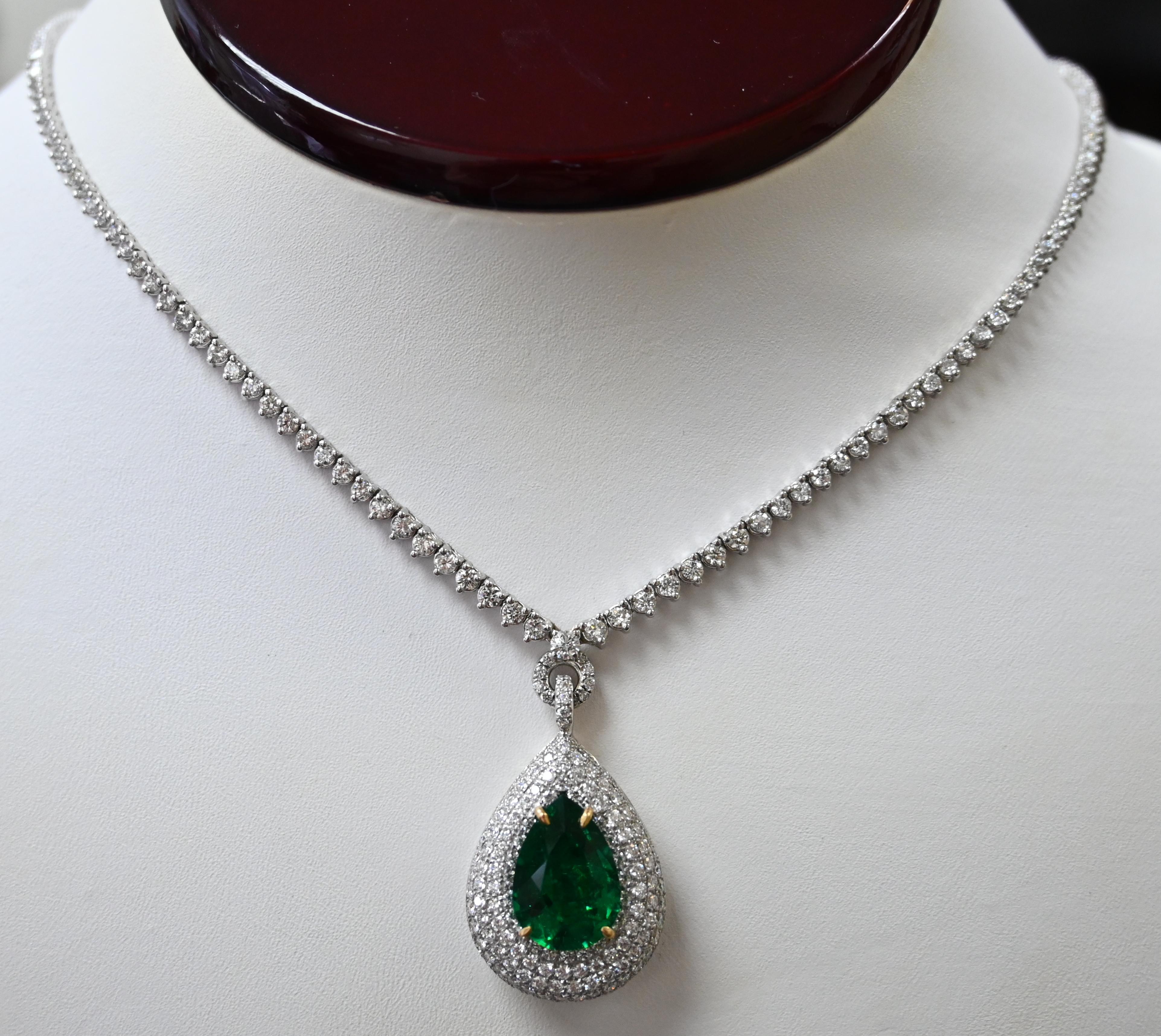 Magnum Creations original design features 6.50 carats of white diamonds and 5.57 carats of emerald, mounted on 18 karats of white gold.

This is a One-Of-A-Kind piece, the center emerald holds a unique, deep and rich color like no other.
