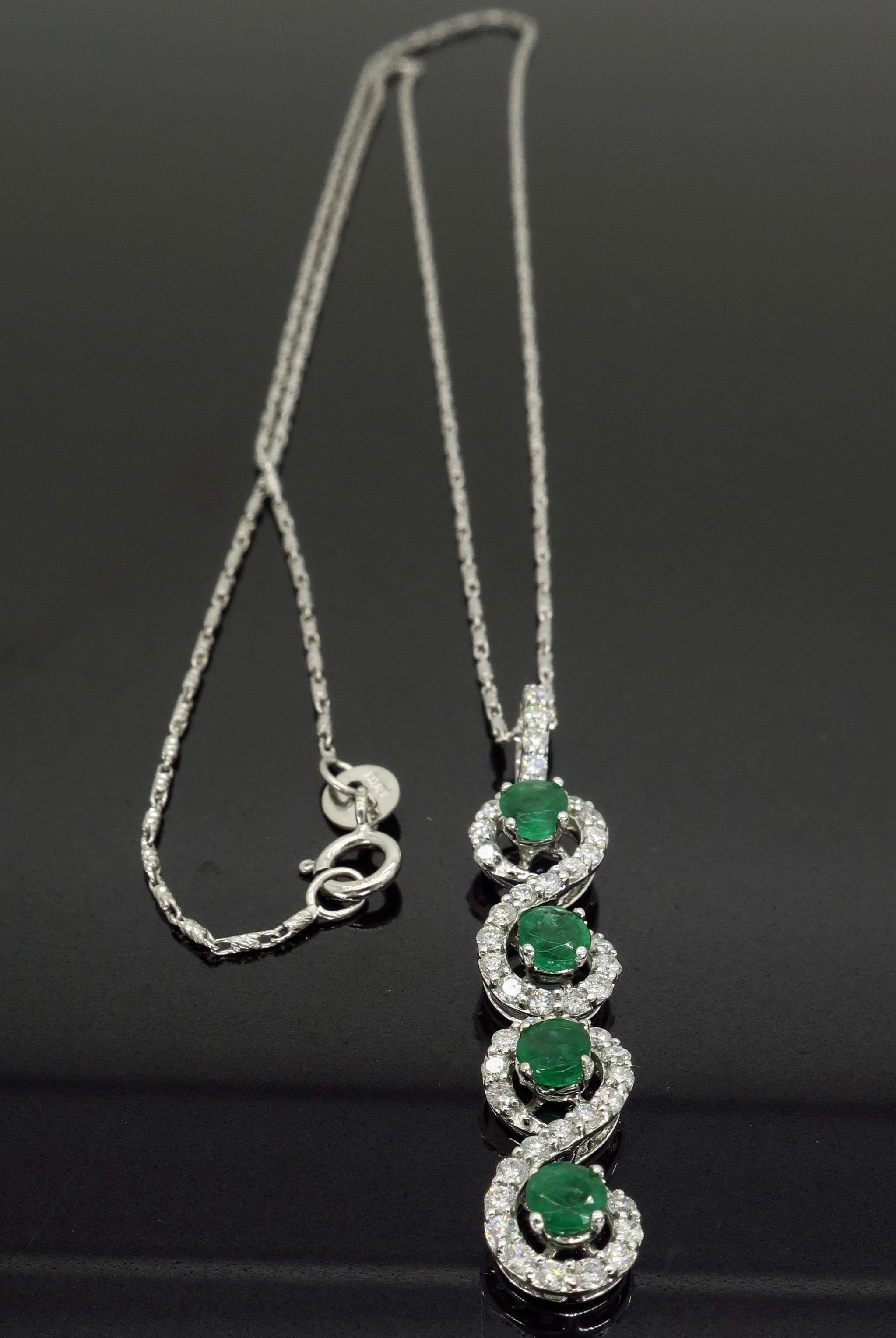 This infinity style necklace features 4 round cut emeralds surrounded by stunning round brilliant cut diamonds.

 
Gemstone: Emerald & Diamonds
Gemstone Carat Weight: .60CTW Round Cut Emeralds
Diamond Carat Weight: Approximately .75CTW
Diamond Cut: