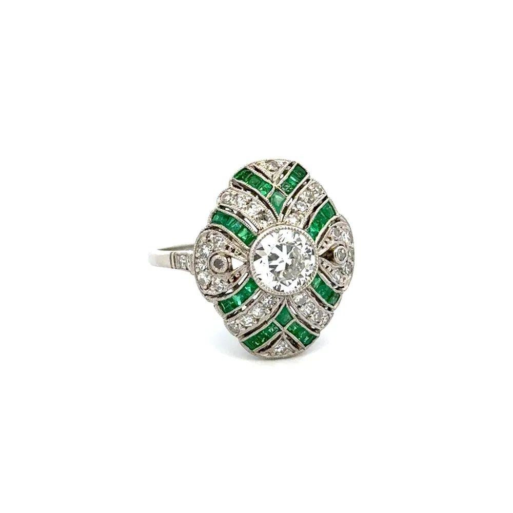 Simply Beautiful! OEC Diamond, surrounded by Emeralds and 0.28tcw Diamonds Platinum Cocktail Ring. Centering a securely nestled Hand set 0.90 Carat Old European Cut Diamond. Complimented by Emeralds, approx. 0.78tcw and Diamonds, approx. 0.28tcw.