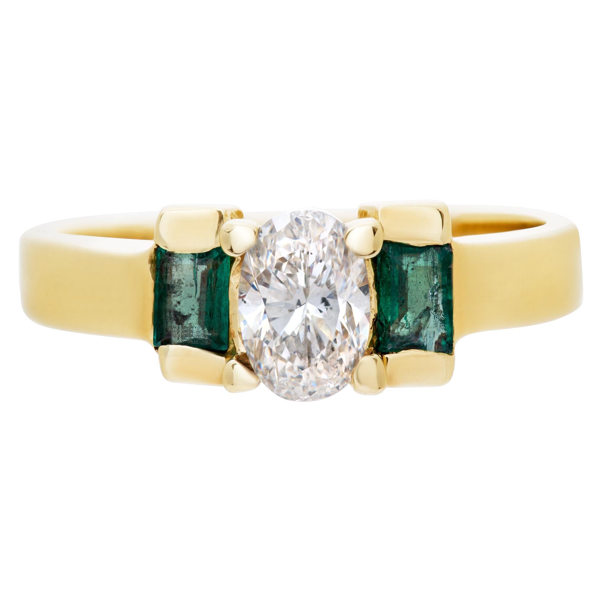Adorable diamond and emerald ring in 14k gold with an app. 0.50 ct oval diamond center (H-I, VS2). Size 6.5

This Emerald ring is currently size 6.5 and some items can be sized up or down, please ask! It weighs 2.7 pennyweights and is 14k.
