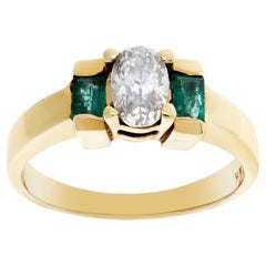 Bague en or 14k avec diamants et émeraudes. Diamant ovale 0,50 carat, "H-I, VS2"