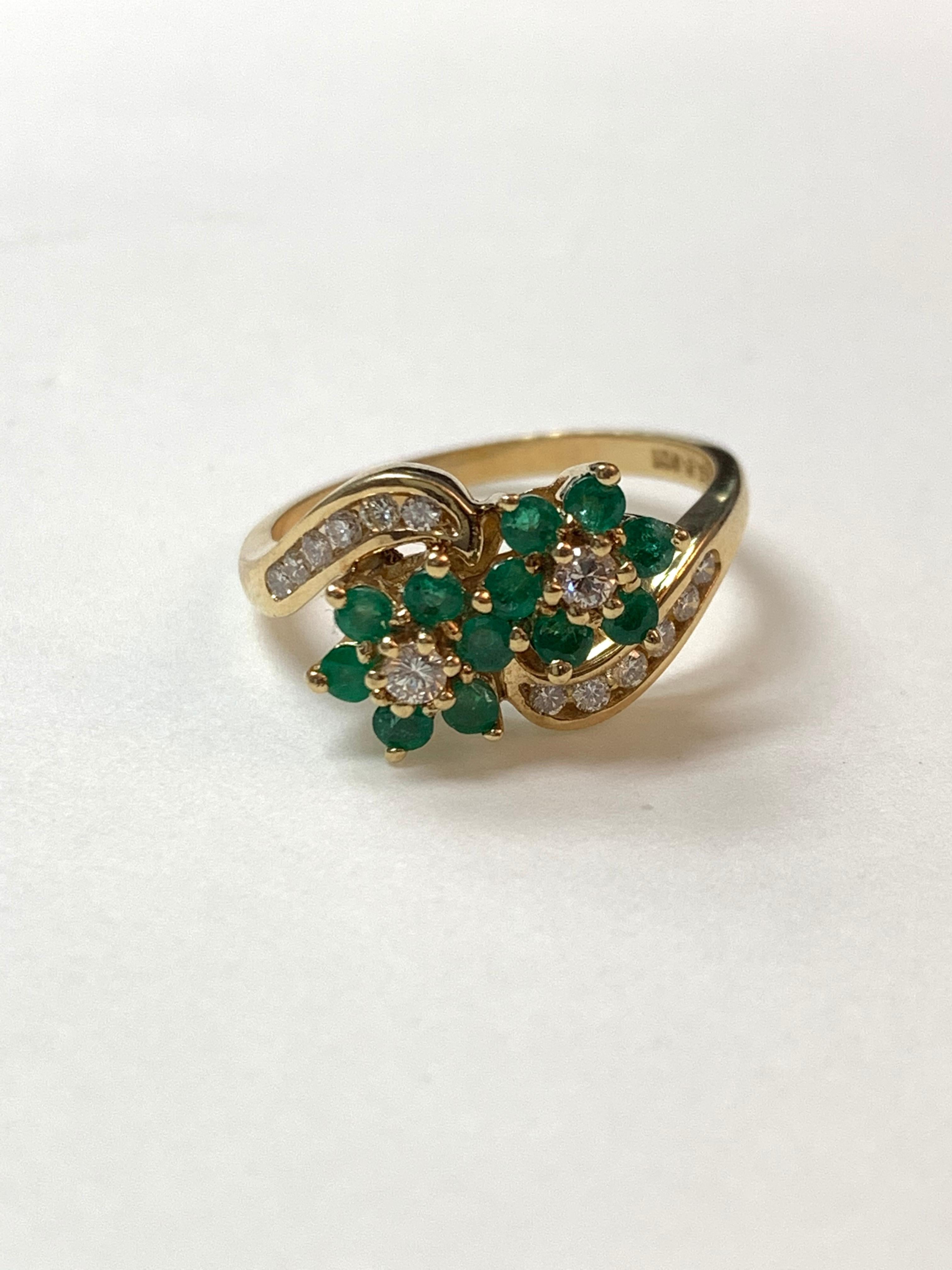 Diamond and Emerald Ring in 14 Karat Yellow Gold. In Excellent Condition In New York, NY