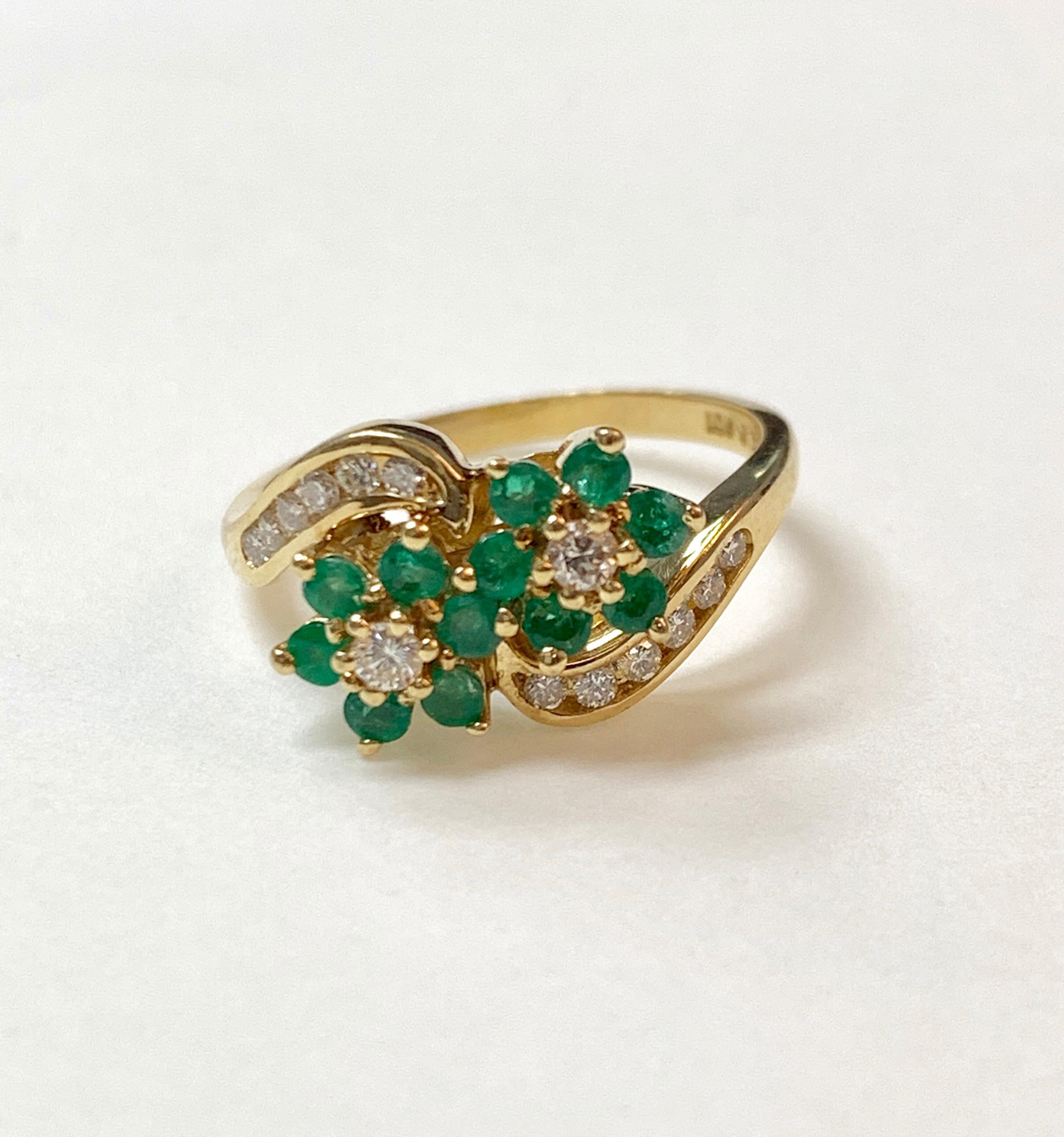Diamond and Emerald Ring in 14 Karat Yellow Gold. 1