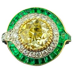 Diamond and Emerald Ring in 18 Karat White and Yellow Gold