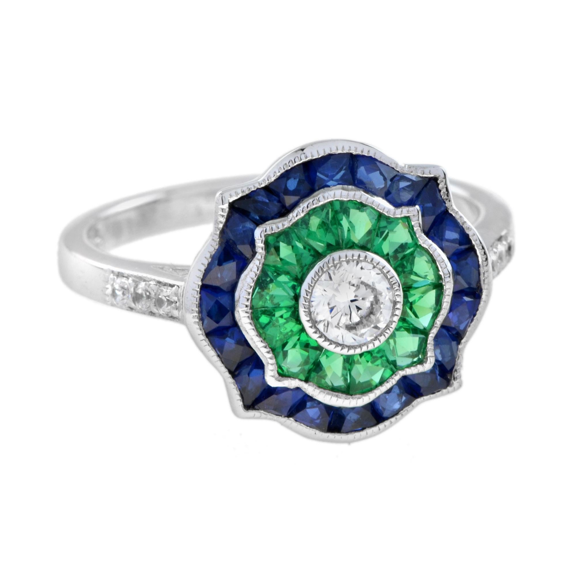 This lovely target ring boasts a center diamond weighing 0.25 carat. The center diamond is encircled by French-cut emeralds and sapphires. In addition to the emerald-sapphire halo. Whether you are looking for a dress ring, or an engagement ring with