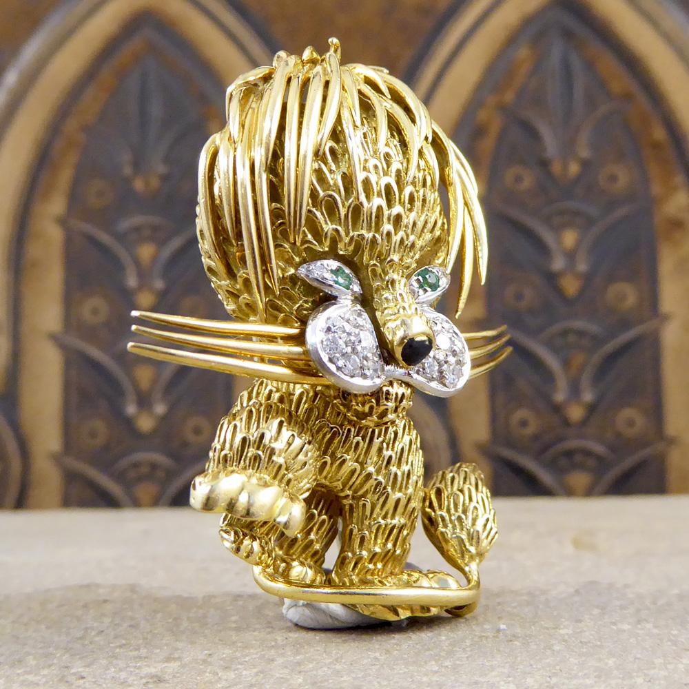 This Vintage brooch has been hand crafted from 18ct Yellow gold in the shape of a Lion with Diamonds set in 18ct White Gold as its facial features and Emerald set eyes. Such a cute little piece. 

Condition: Very Good, slightest signs of wear due to