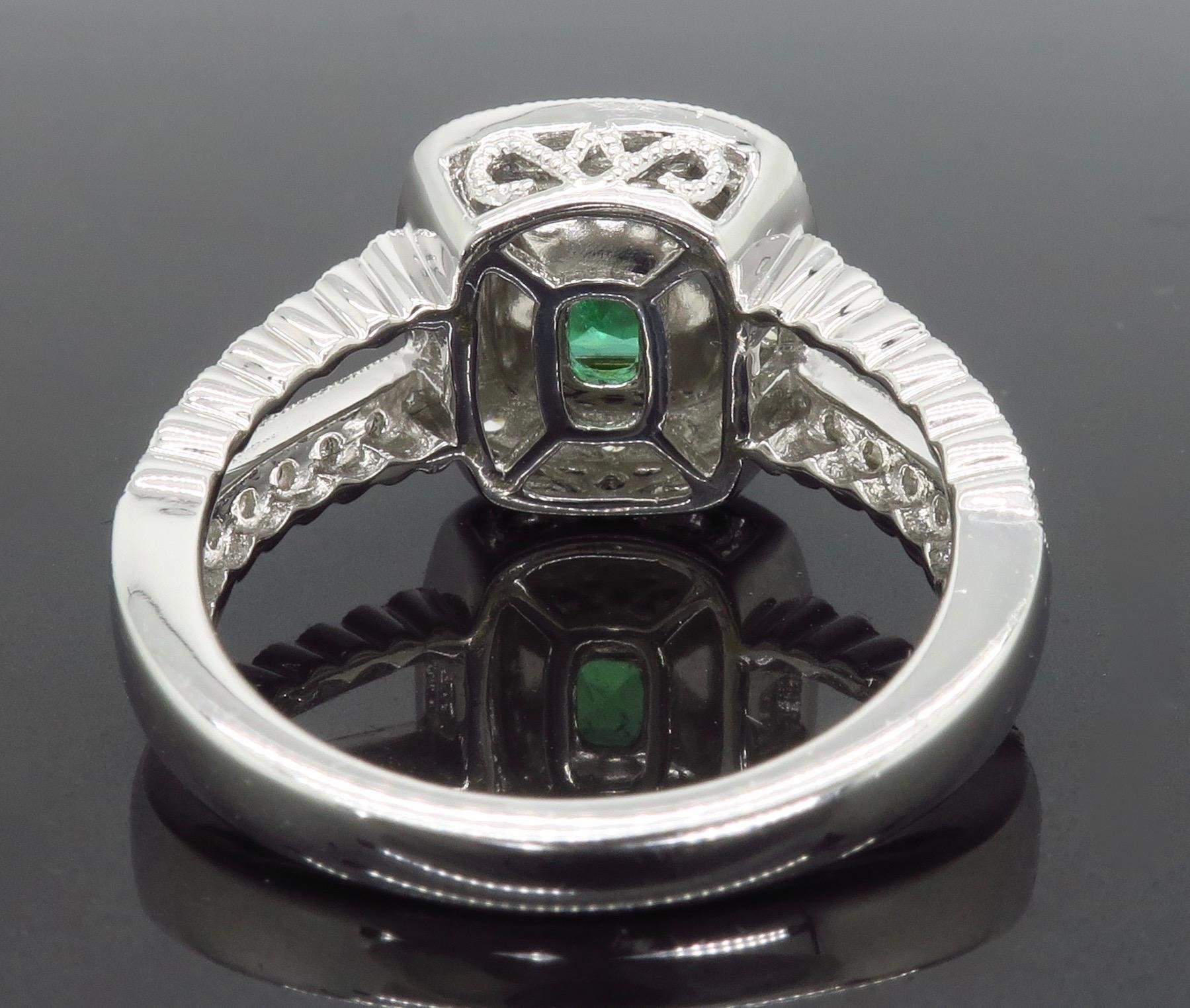 Diamond and Emerald Split Shank Ring in 18 Karat 1