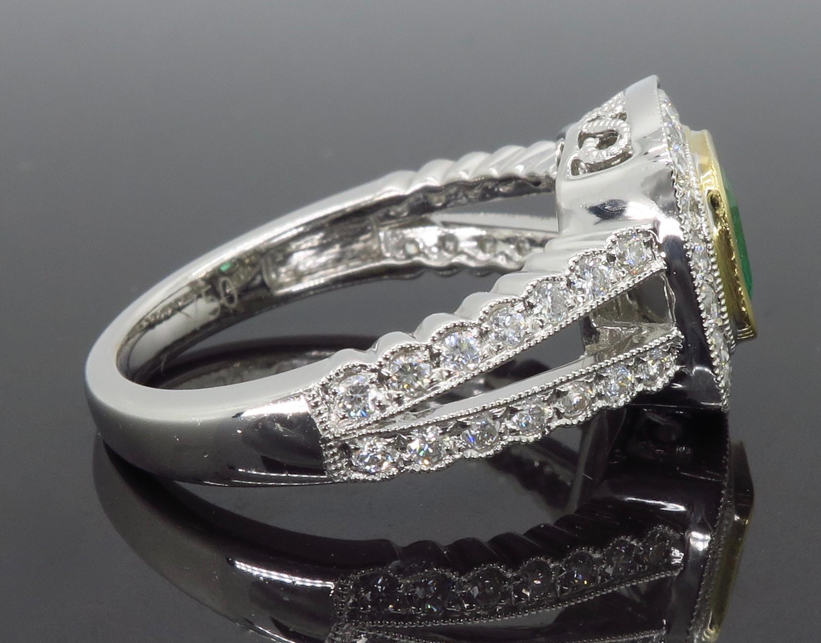 Diamond and Emerald Split Shank Ring in 18 Karat 2