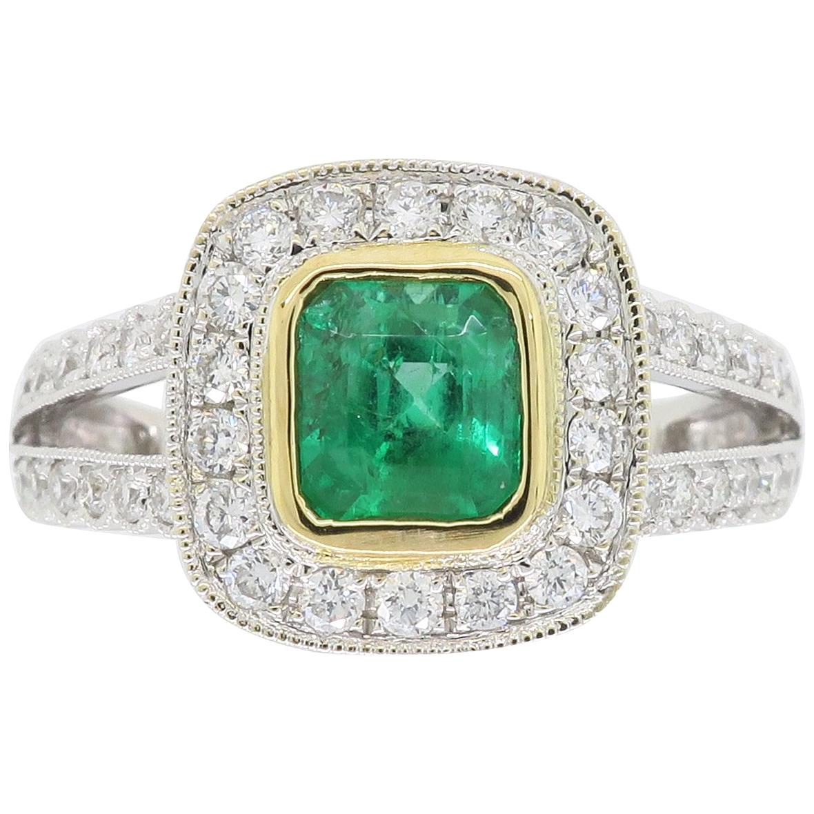 Diamond and Emerald Split Shank Ring in 18 Karat