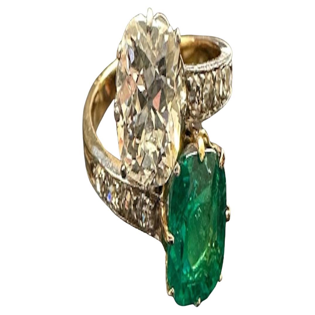 Diamond and Emerald Toi et Moi ring For Sale at 1stDibs