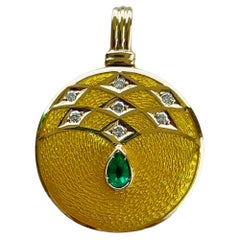 Vintage Diamond and Emerald Yellow Enamel Disc Pendant in 18 Karat Gold. 1960s.