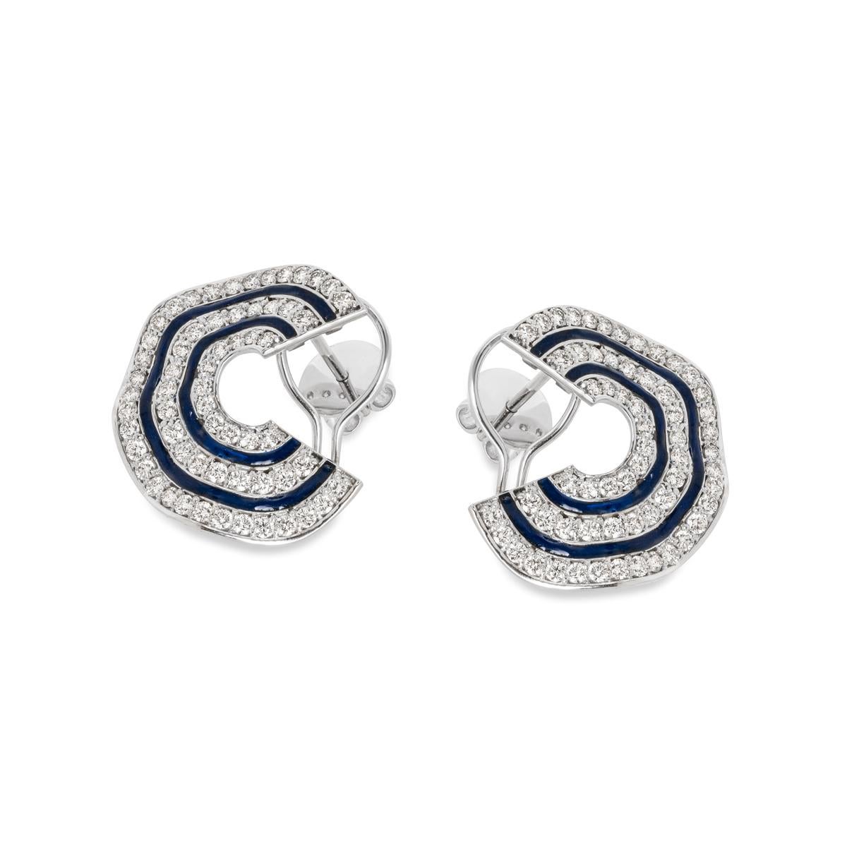 A beautiful pair of diamond and enamel earrings. The earrings are of a circular three dimensional wave design, set with a total of 122 round brilliant cut diamonds throughout 3 rows. The total diamond weight is approximately 3.28ct, G-H colour and