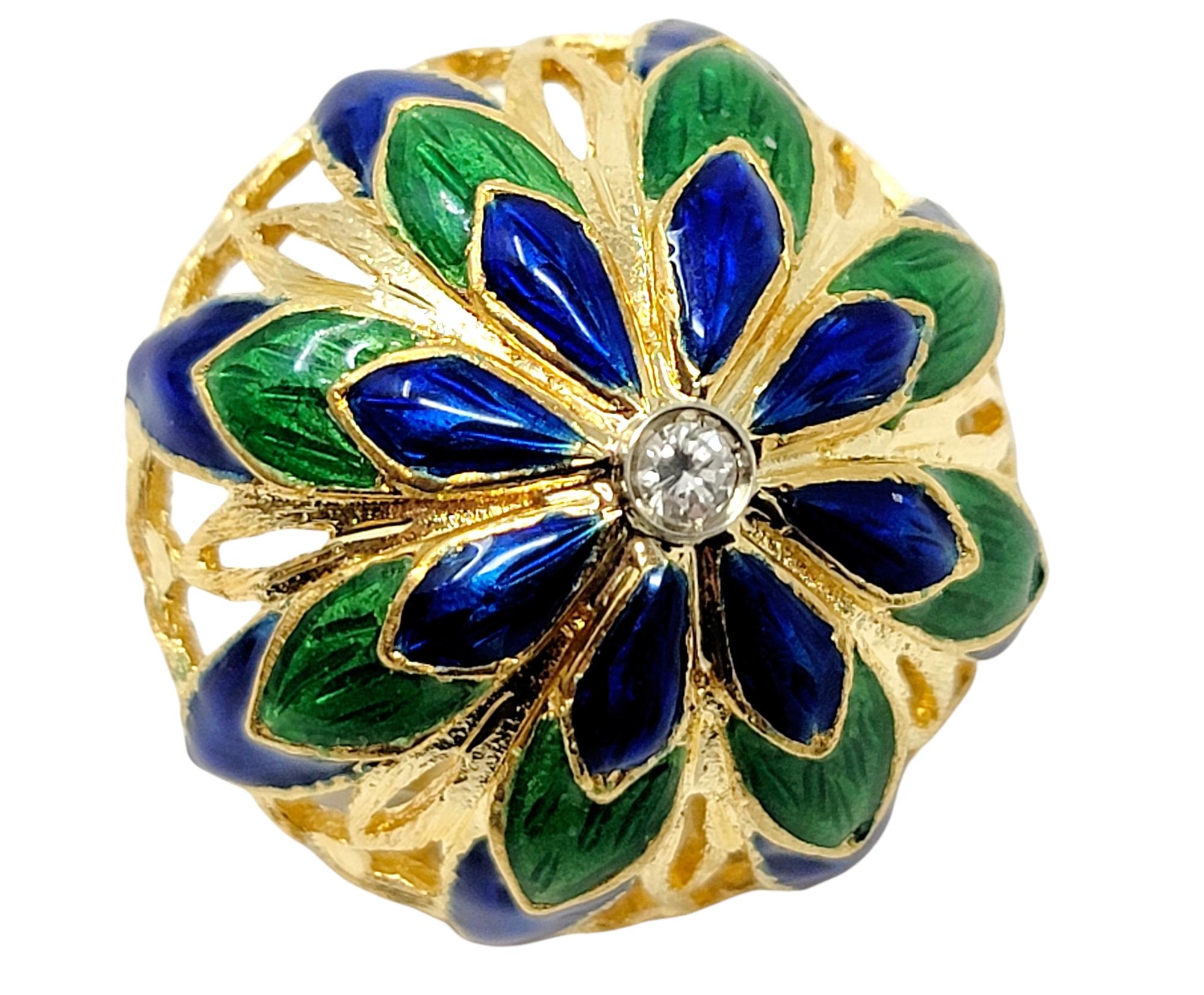 These vibrant floral domed earrings are absolutely incredible! Bold in both size and design, these colorful beauties feature bright blue and green enamel petals accented by a single sparkling diamond and set in 14 karat gold. Made for any ear, these