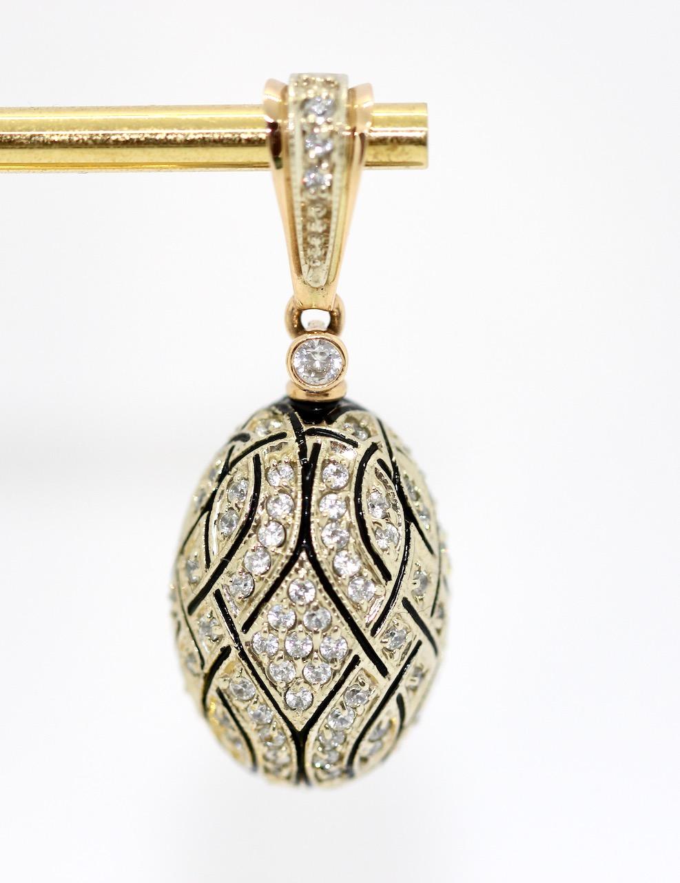 Charming diamond and enamel Pendant, Enhancer in 14k rose gold with the design of the Faberge eggs.

We also offer the matching Earrings and ring.

Includes certificate of authenticity.