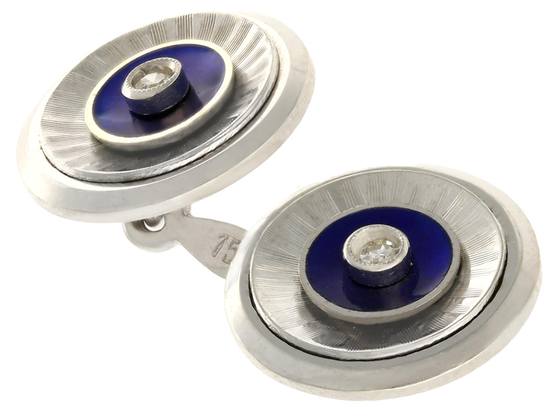 An impressive pair of antique 1920s 0.12 carat diamond and blue enamel, 18 karat white gold cufflinks; part of our diverse antique jewelry and estate jewelry collections.

These fine and impressive antique cufflinks have been crafted in 18k white