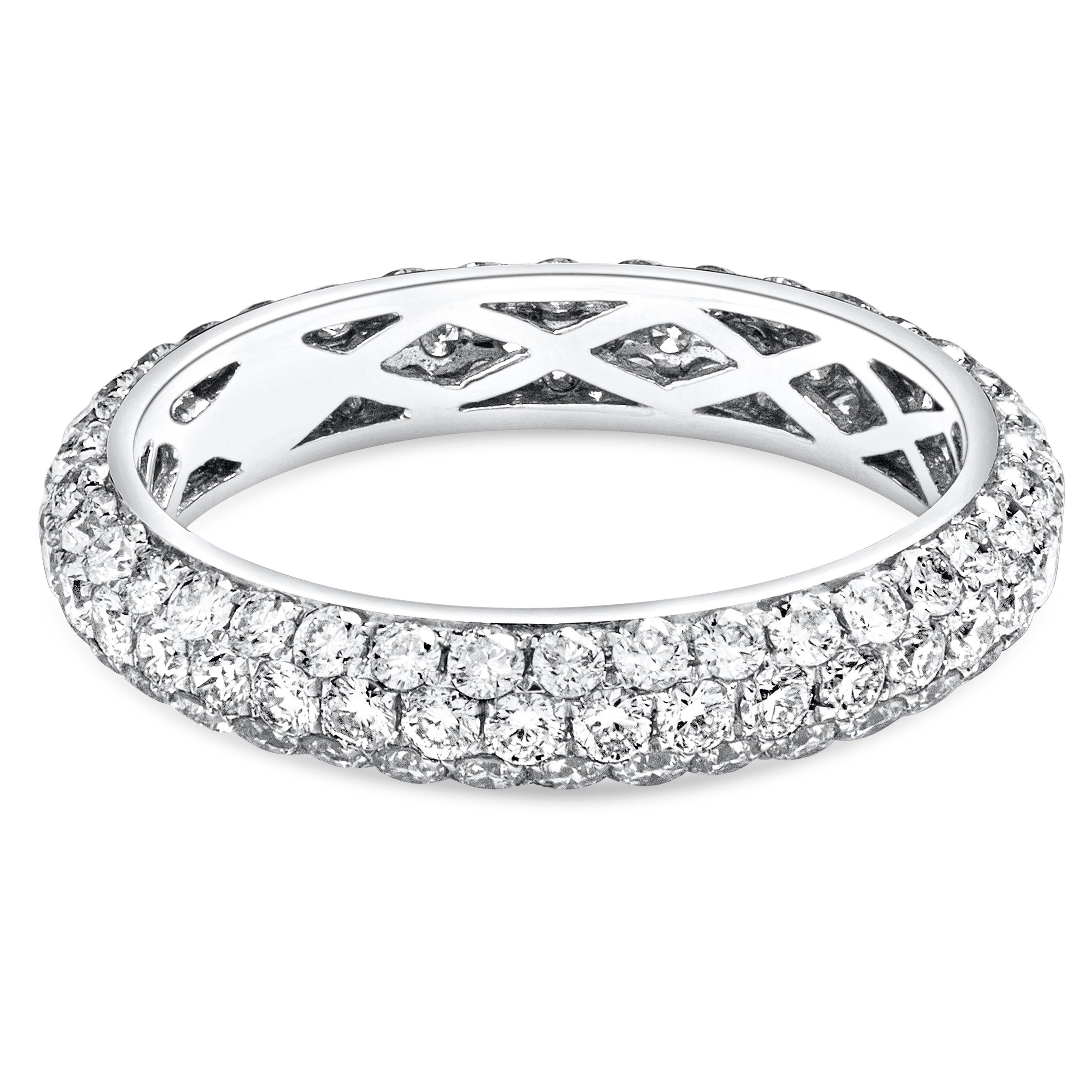 A unique three-row eternity wedding band ring showcasing brilliant round diamonds weighing 1.78 carats total. Set in a rounded micro-pave setting, Made with 18K White Gold, Size 6.5 US

Roman Malakov is a custom house, specializing in creating