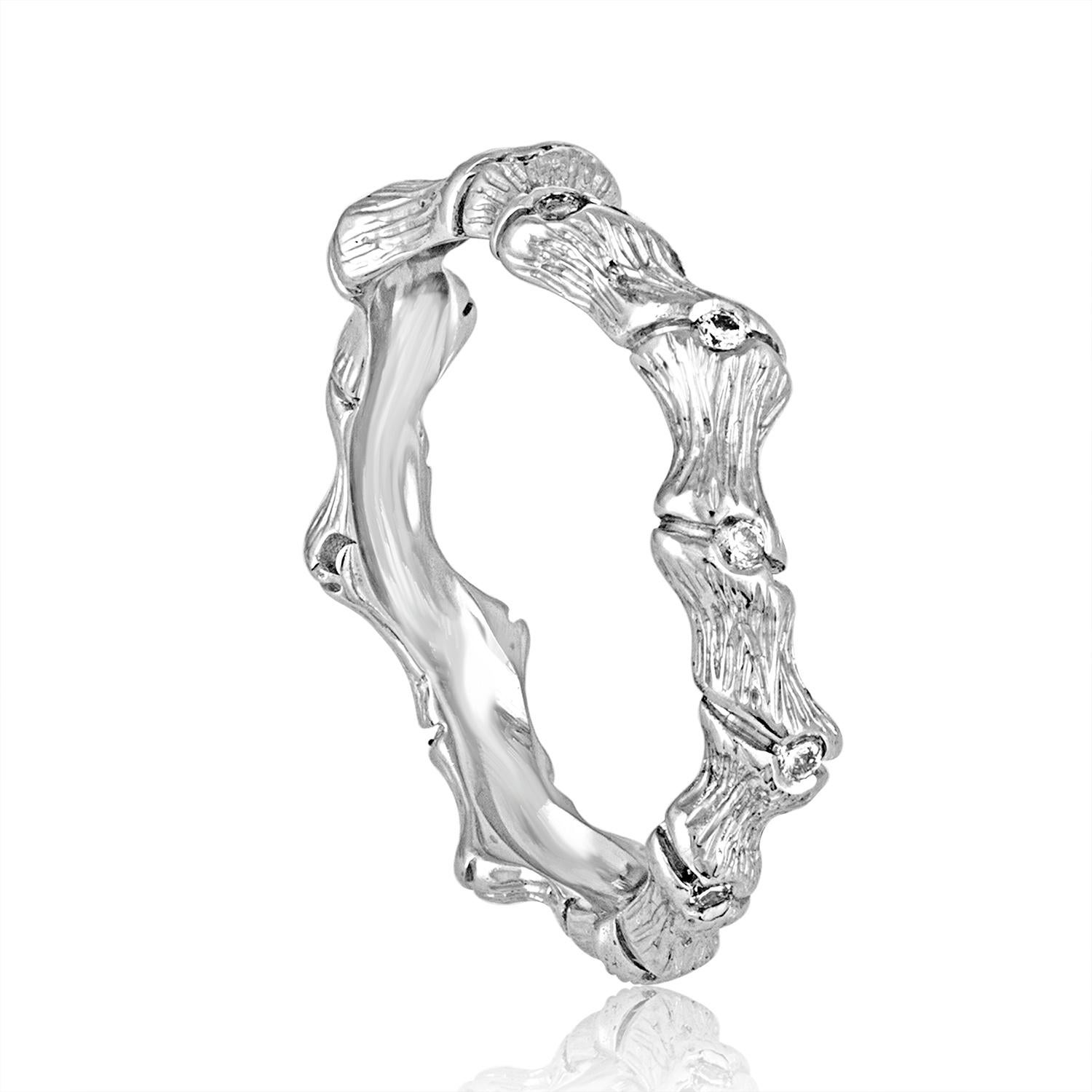 Bamboo Style Band Ring
The ring is 18K White Gold
There are 0.10 Carats in Diamonds I SI
The ring is a size 6.5.
The ring can be sized smaller by adding a guard.
The ring CAN NOT be sized larger.
The ring weighs 3.2 grams.