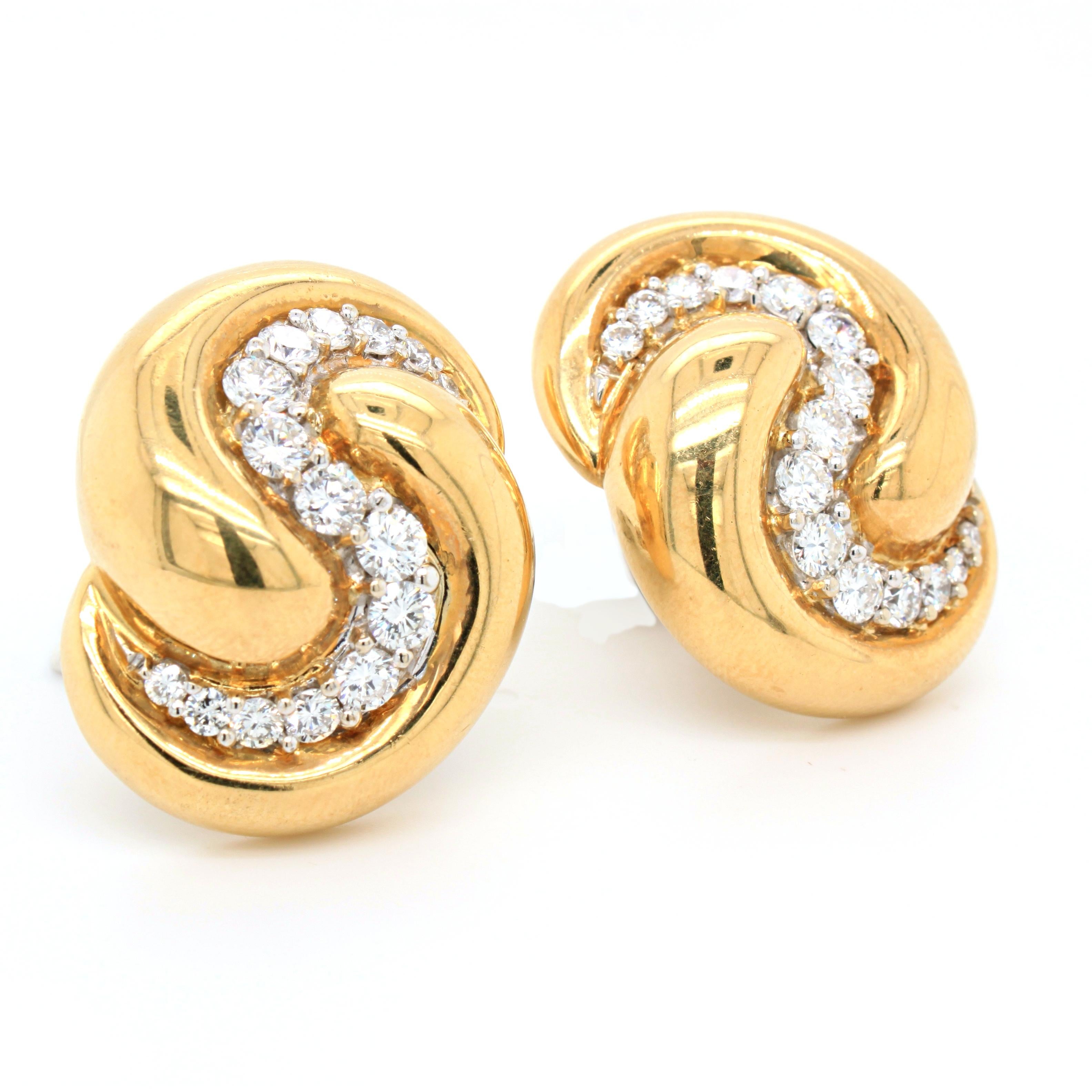 Diamond and gold bombé earrings in 18k yellow gold. 
The earclips are designed in an S-shape with a round brilliant cut diamonds in the centre of the design flow, whereas the diamonds are of extremely fine quality (D/E colour and IF/VVS clarity),