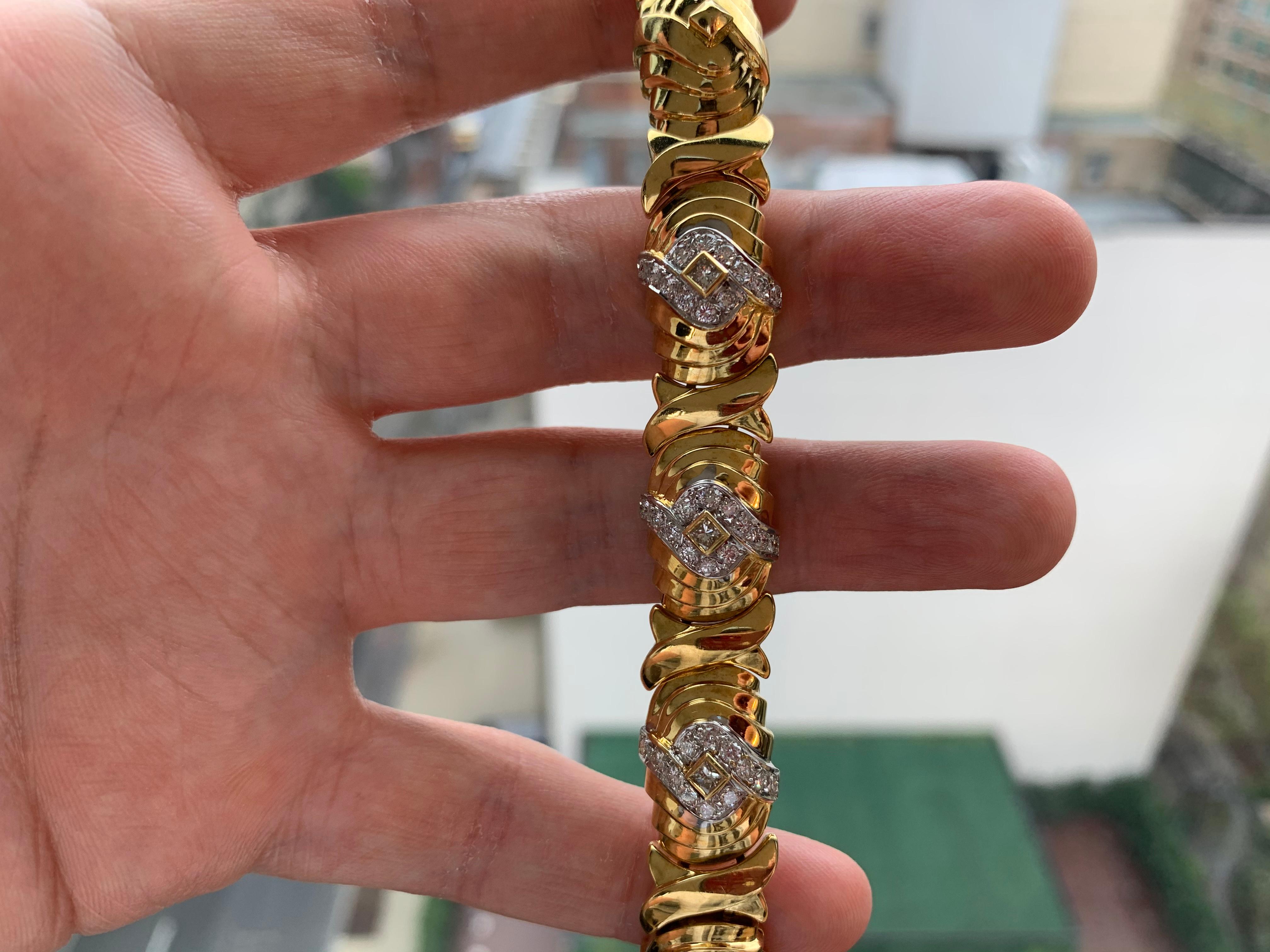 Men's Diamond and Gold Bracelet by elan

18 karat gold bracelet with square diamonds 
Size: 7 ½ inches
Weight:  83.1 grams

Made circa 1980