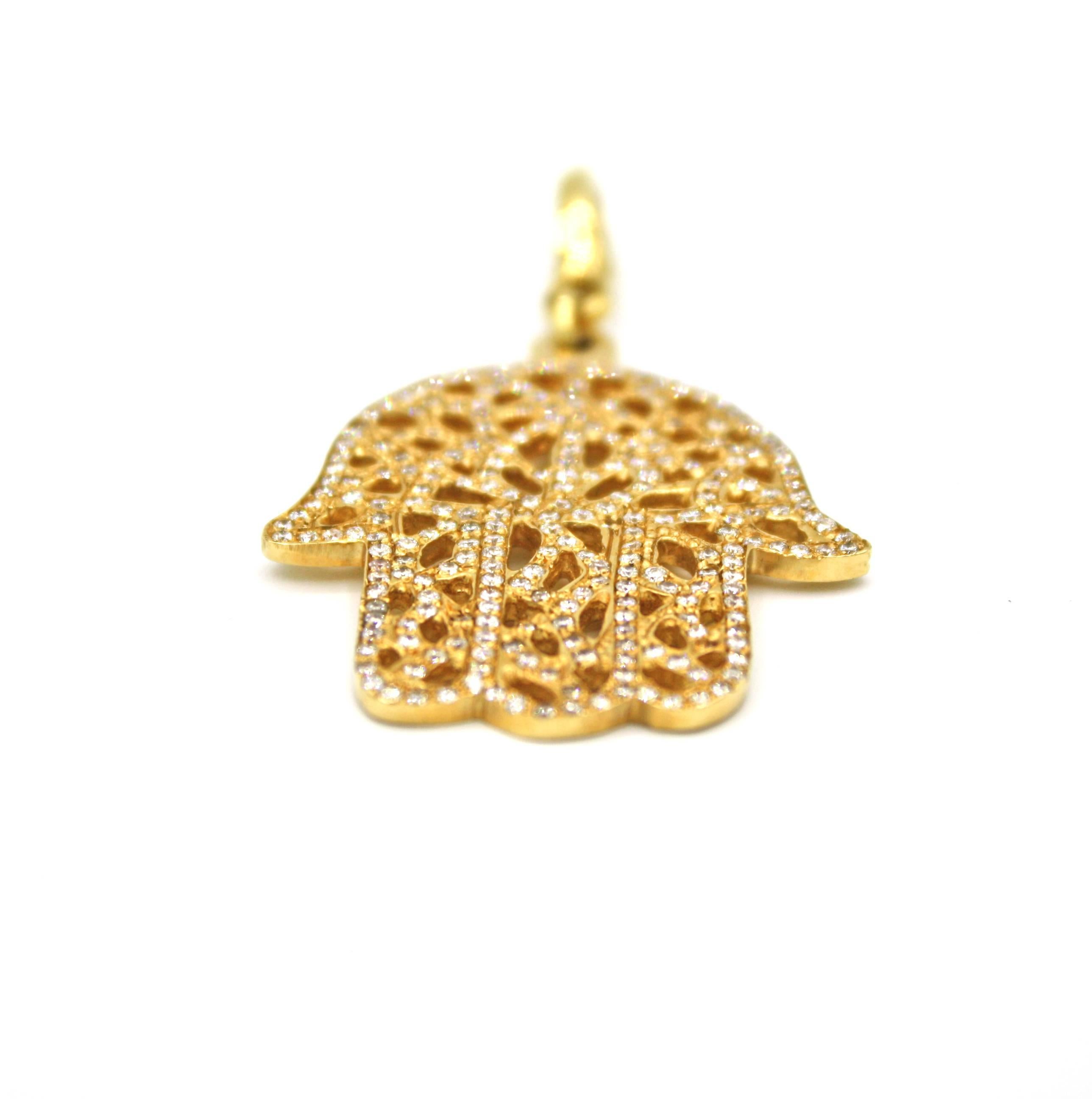 This wonderful 18k yellow gold Hamsa hand has 253 diamonds, 1.40 cts (VS Clarity) in total.  A solid gold clasp attached allows this pendant to be be very versatile, and can be put on to an array of different size chains or cords.