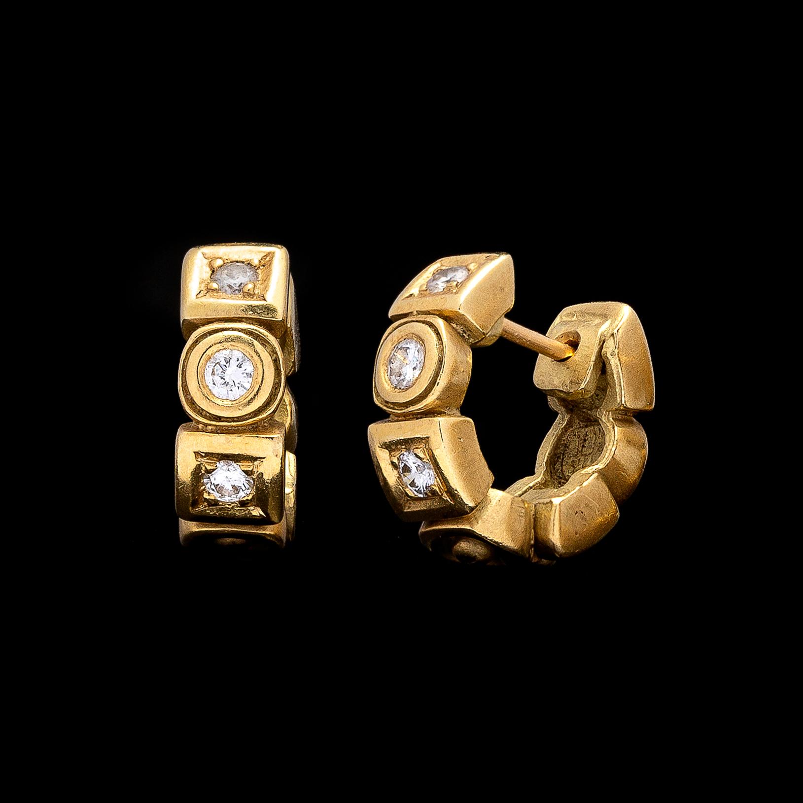 Great for everyday wear! The 18k gold earrings designed with alternating square and round sections, set with 6 round brilliant-cut diamonds, for a total weight of 0.24ct. , G-H color and VS clarity. The earrings weigh 7.6 grams and measure