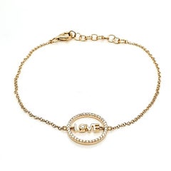 Diamond and Gold LOVE  bracelet in 18 K gold