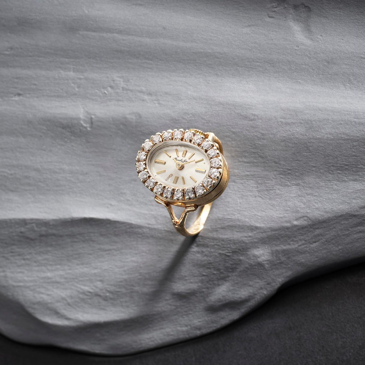 This completely fabulous Bueche Girod ring watch, crafted in gold and adorned with 20 diamonds, epitomises Swiss luxury. Founded in 1947, the brand is renowned for its exquisite fusion of timekeeping and elegance.

Ring watches, miniature marvels of