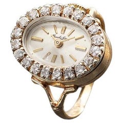 Orologio con anello in oro e diamanti di Bueche Girod